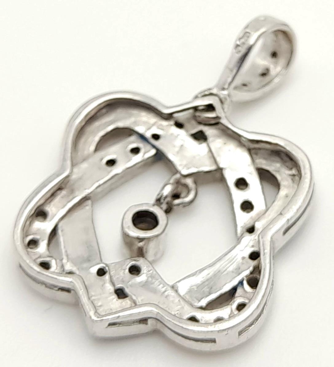 A 9K WHITE GOLD DIAMOND SET DOUBLE ENTWINED HEART PENDANT 2.8G , 24mm x 15mm. SC 9023 - Image 2 of 4