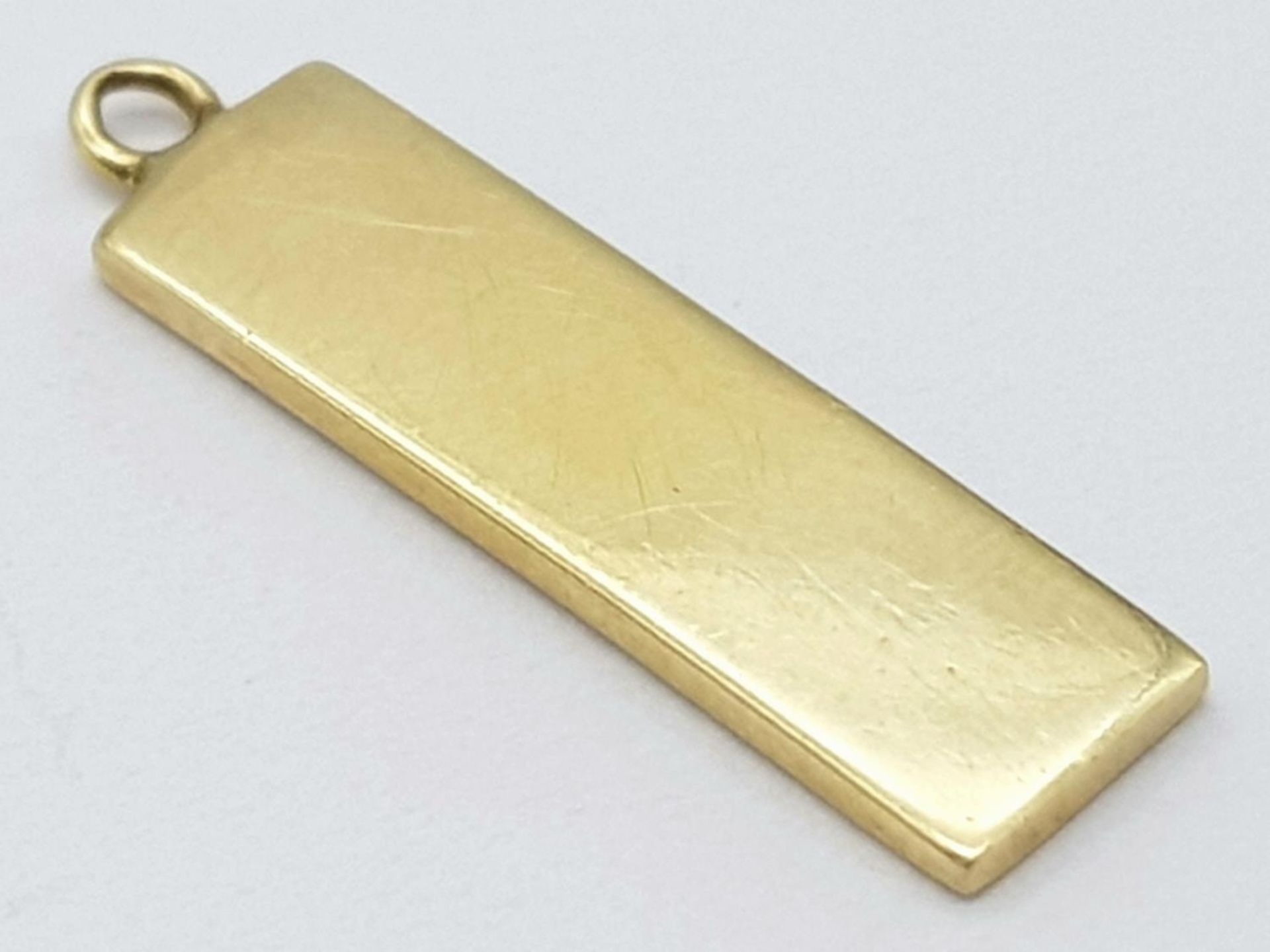 A 9K YELLOW GOLD INGOT PENDANT 1.5G , 21mm x 6mm. SC 9016 - Image 3 of 4