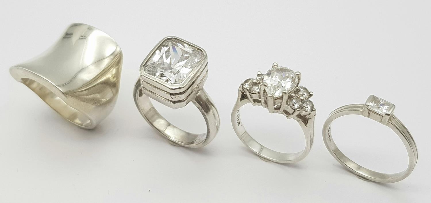A Selection of 4 sterling silver rings, some set with cubic zirconia, sizes N-R, total weight 28.3g. - Image 3 of 6