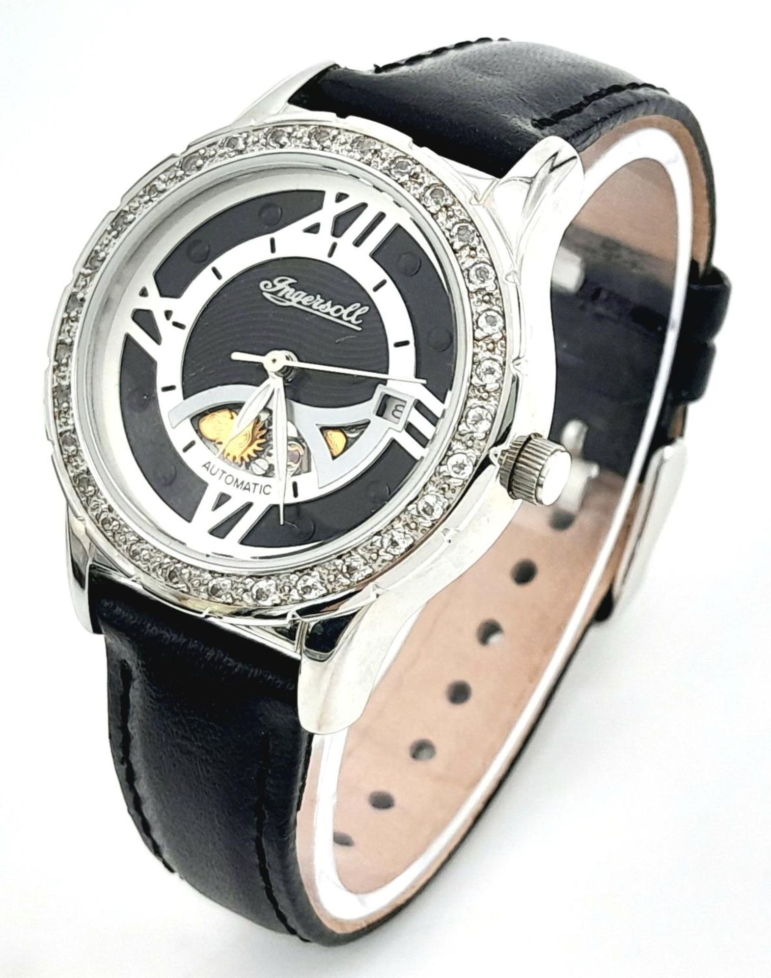 An Ingersoll Automatic Skeleton Ladies Watch. Black leather strap. Stainless steel case - 32mm.