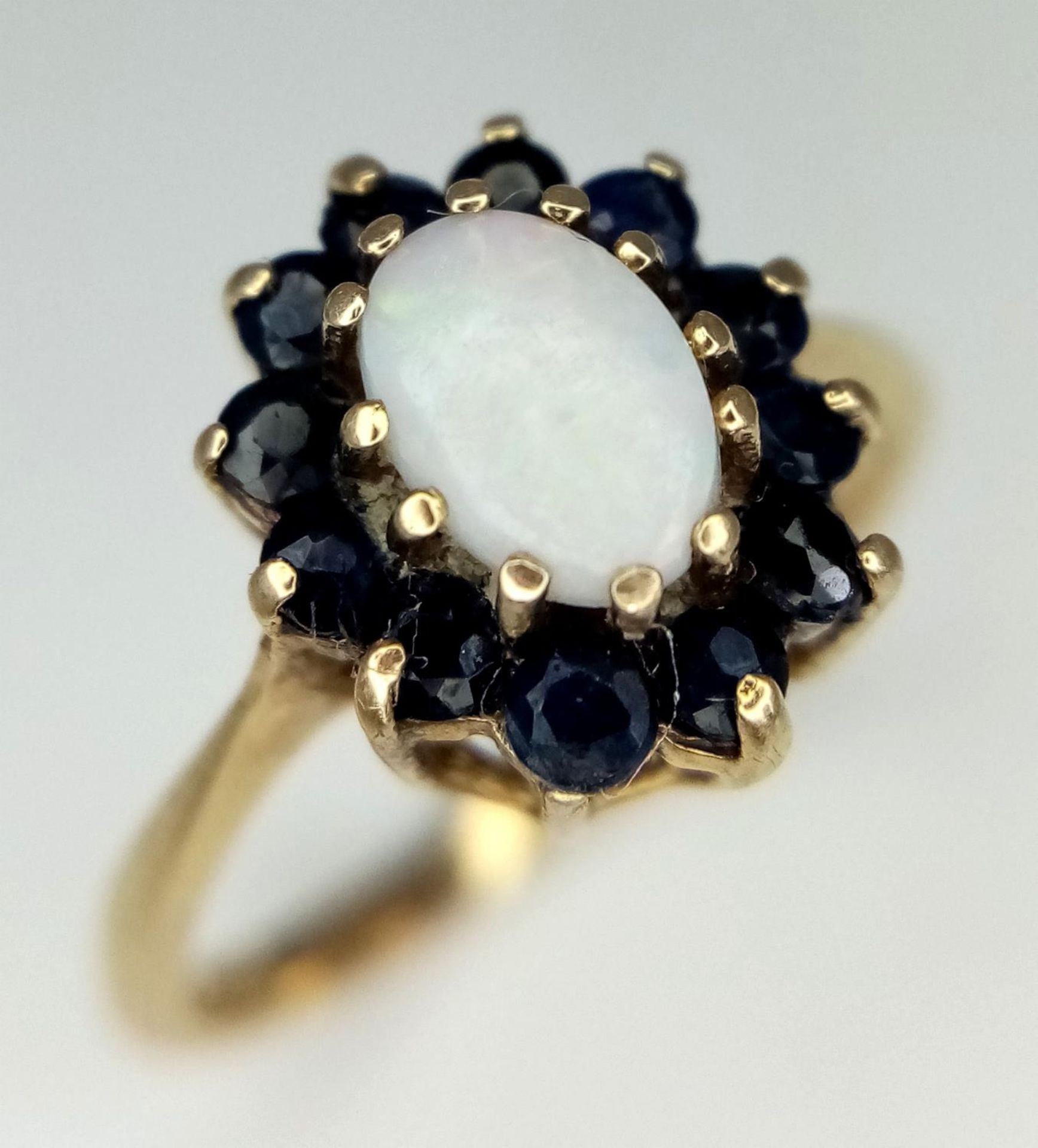 A 9K YELLOW GOLD SAPPHIRE & OPAL CLUSTER RING 2G SIZE L 1/2. SC 9075