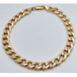 A 9K Yellow Gold Flat Curb Link Bracelet. 19cm. 6.1g weight.