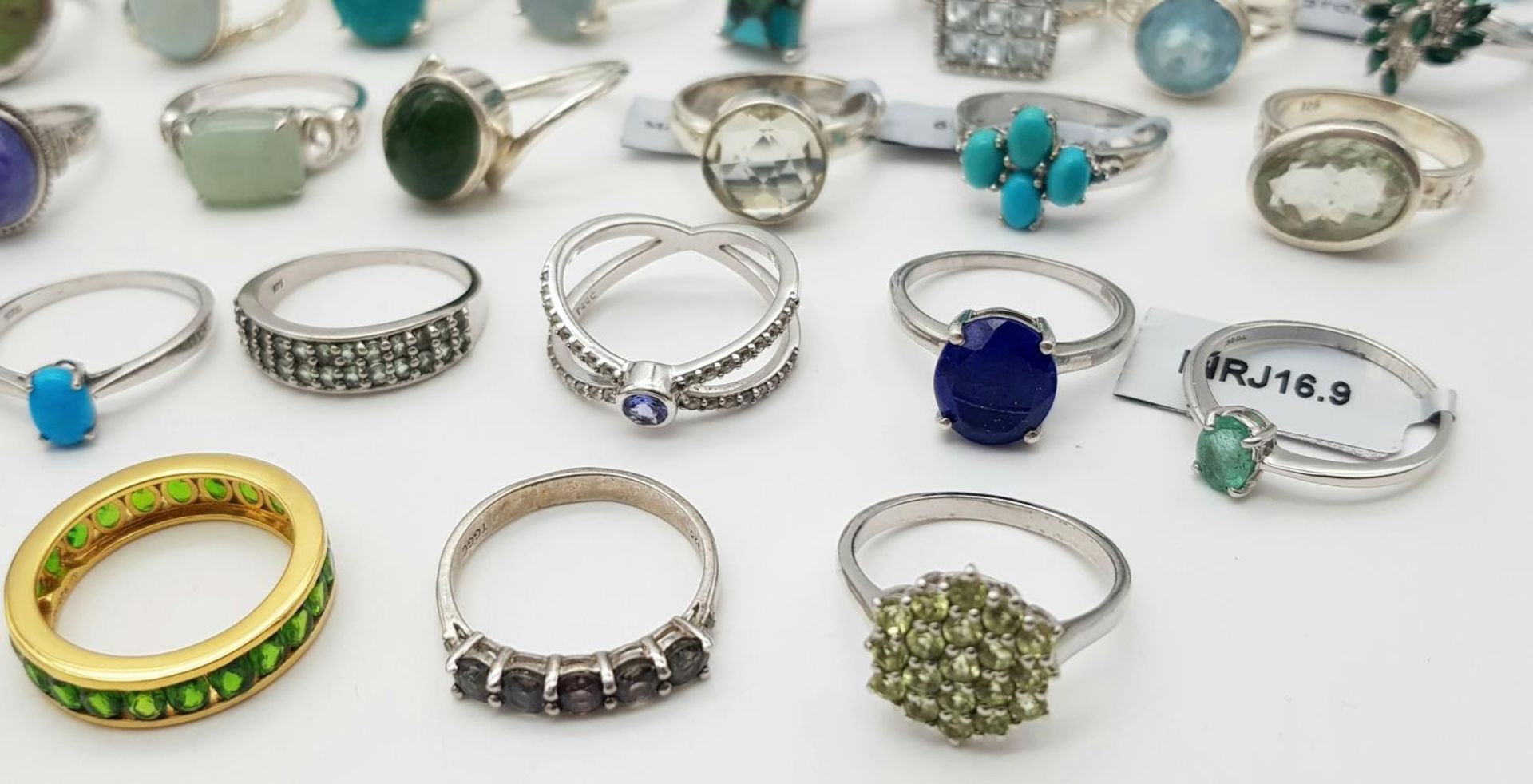 An impressive collection of forty sterling silver rings in a variety of designs. all adorned with - Image 7 of 7