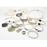 A sterling silver job lot consisting of four pearl necklaces, 7 bangles. 1 pendant and 1 ring