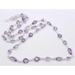 An Amethyst Multi-Shape Gemstone Long Chain Necklace. Set in 925 Silver. 68cm length. 20g. Ref: CD-