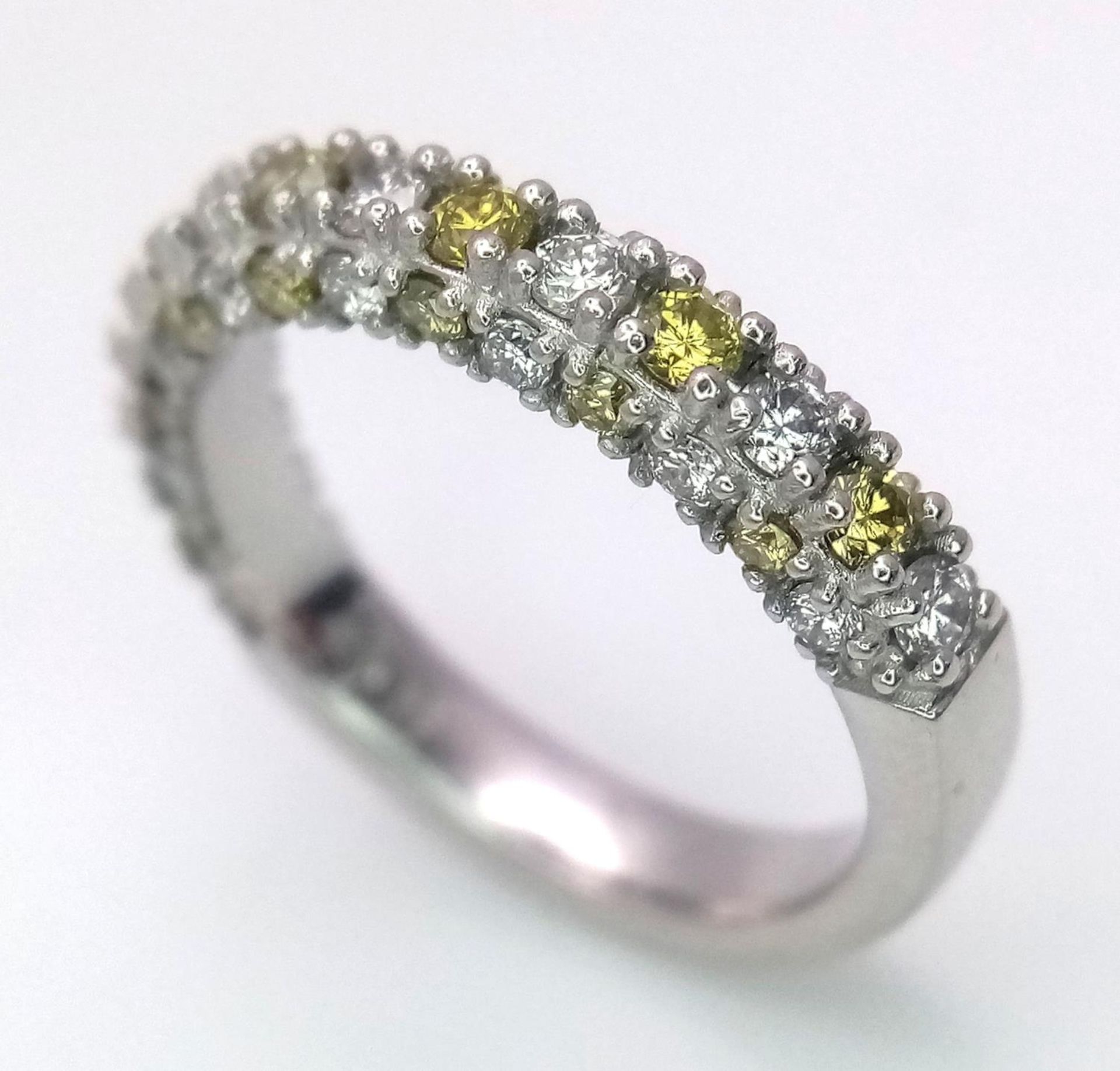 A Platinum White and Yellow Diamond Three-Sided Half Eternity Ring. Size L. 6.3g total weight. - Bild 5 aus 9