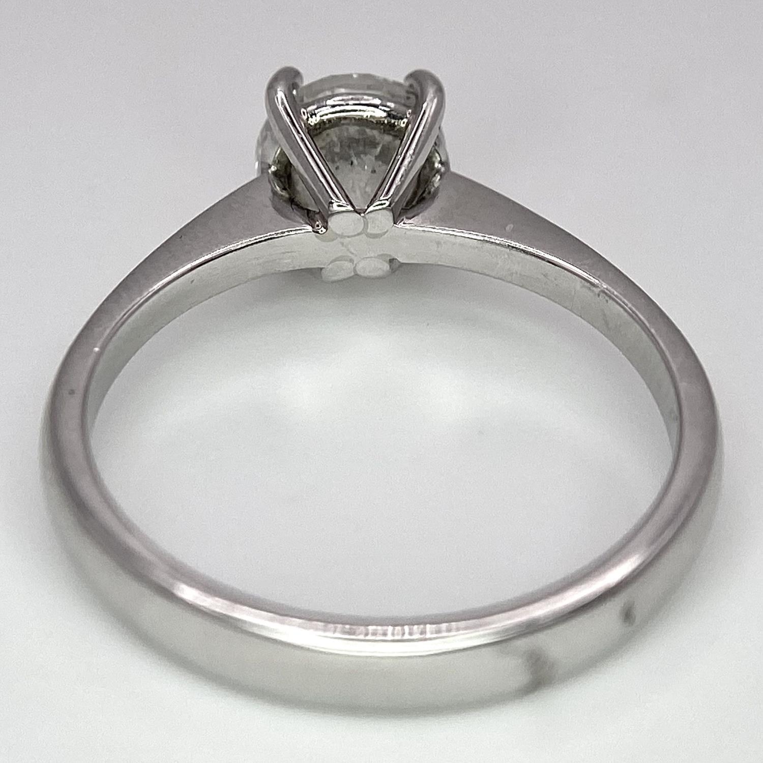 A Platinum Diamond Solitaire Ring. Size L. 4.1g total weight. - Image 5 of 6