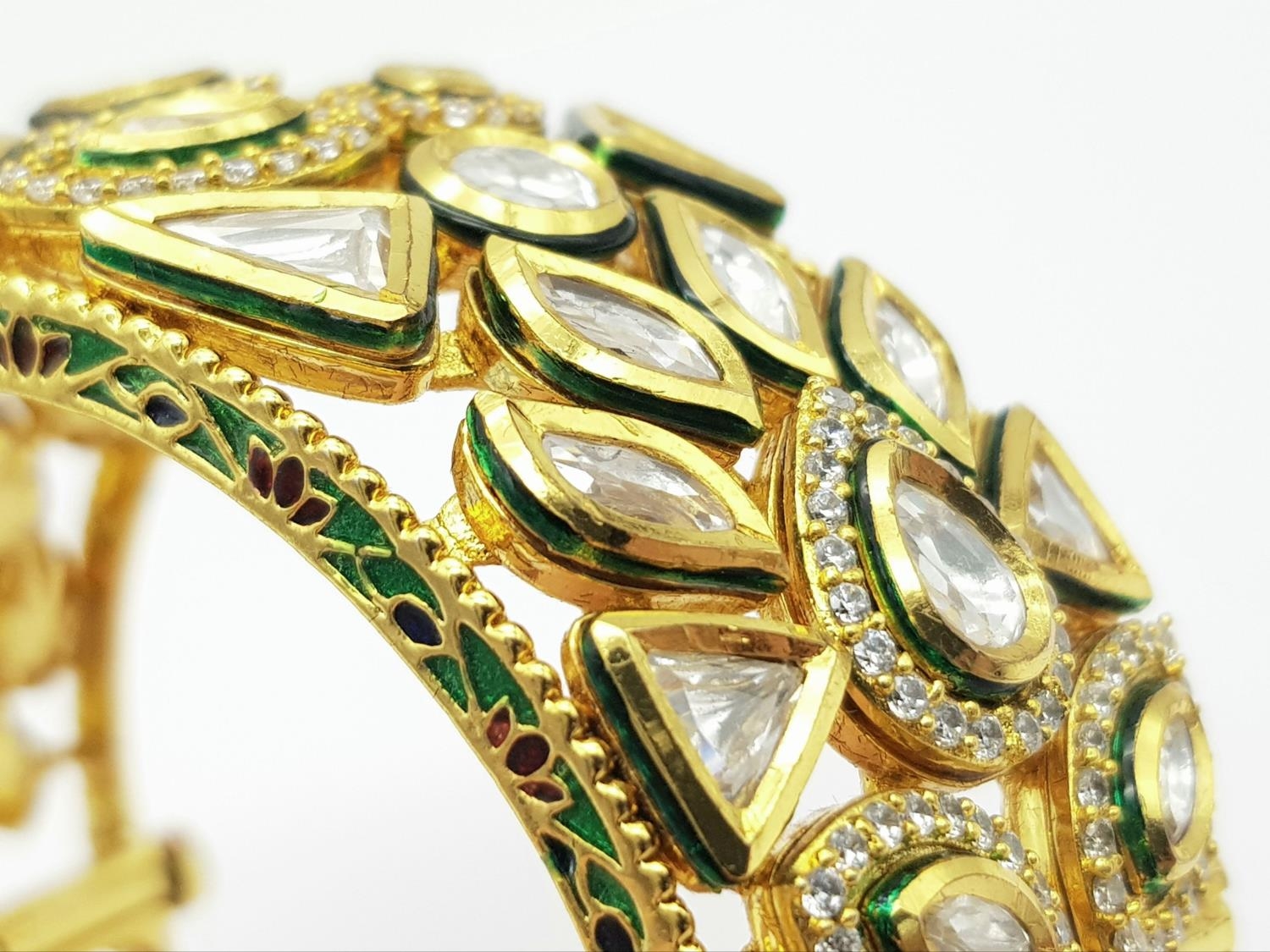 A Mughal Style White Stone and Enamel Bangle. 5.5cm diameter, 3cm band width, 97.12g total weight. - Image 5 of 5