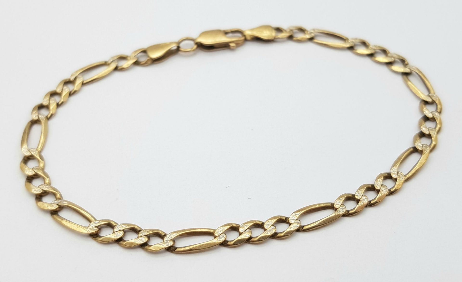 A Vintage 9K Yellow Figaro Link Bracelet. 18cm. 4.7g weight.