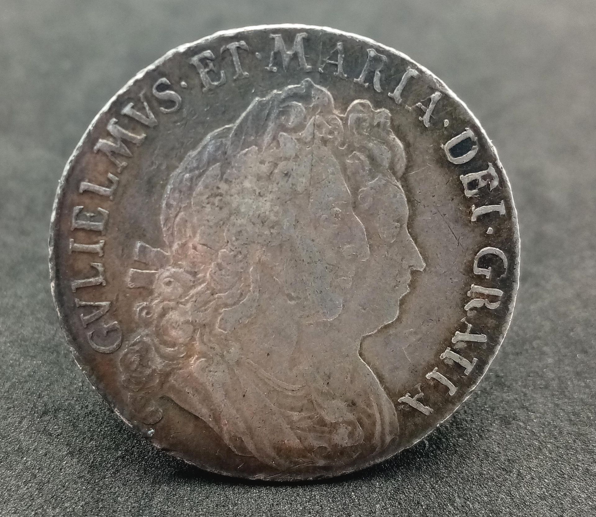 A 1693 Half Crown Qvinto Silver Coin. Inverted 3. VF grade but please see photos.