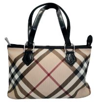 A Burberry Beige Check Nova Bag. Coated canvas exterior with leather trim, two leather straps,