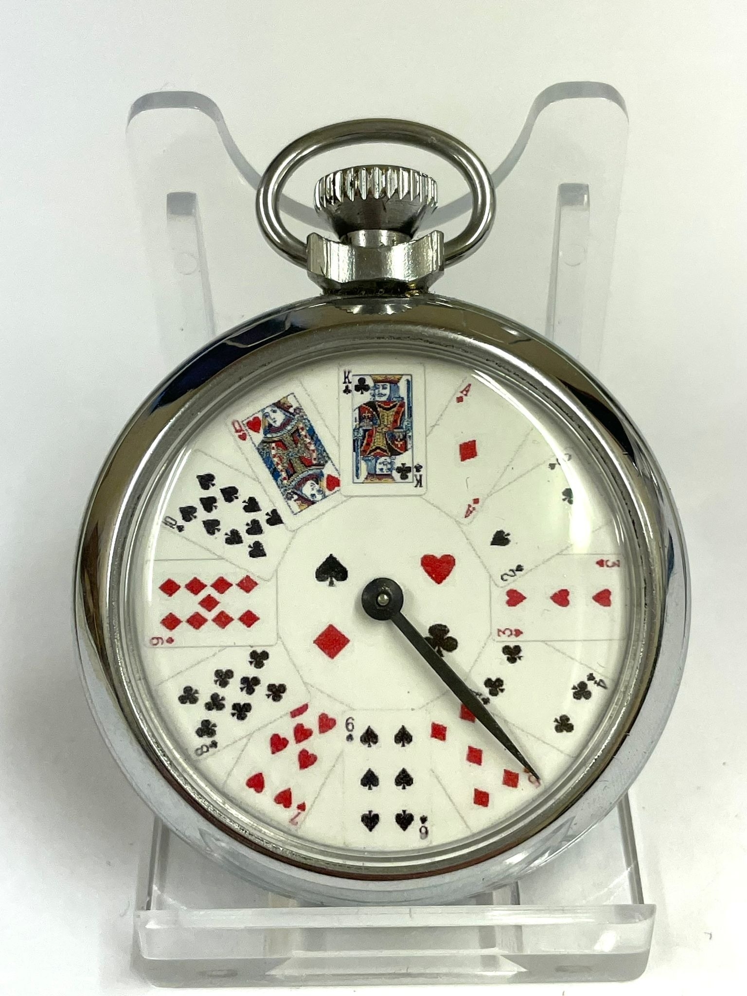 A Vintage cards spinning gaming pocket watch. In working order.