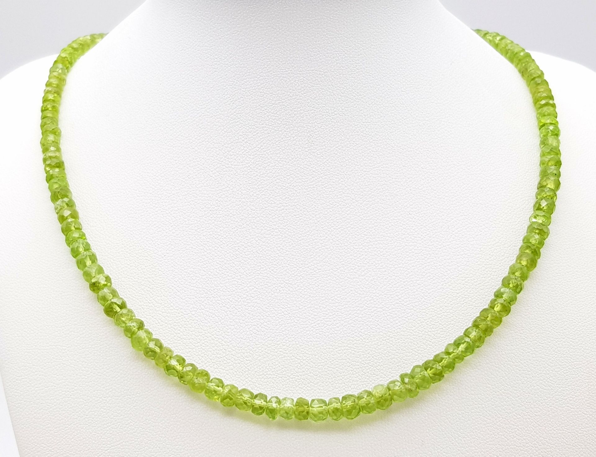 A Peridot Gemstone Tennis Bracelet with a Peridot Rondelle Necklace. Both with silver clasps. - Image 3 of 6