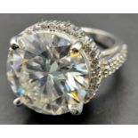An 11.40ct White Moissanite Statement Dress Ring. Set in 925 Silver. Size O. 8g total weight.