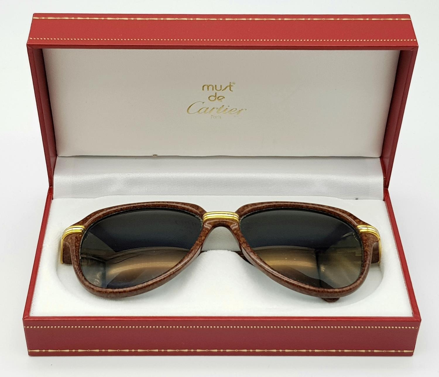 A Pair of Cartier Brown Vitesse Sunglasses. Elegant marble carbon frame with Cartier watermarks on - Image 7 of 9