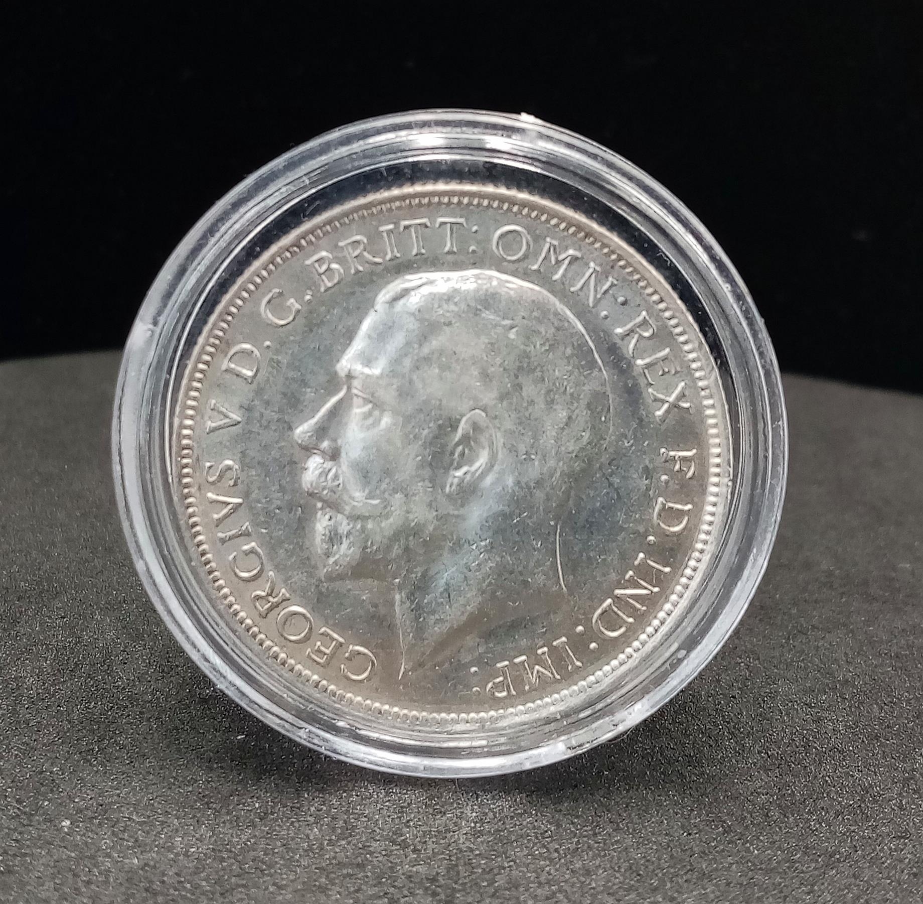 An Uncirculated 1916 Silver George V Coin.