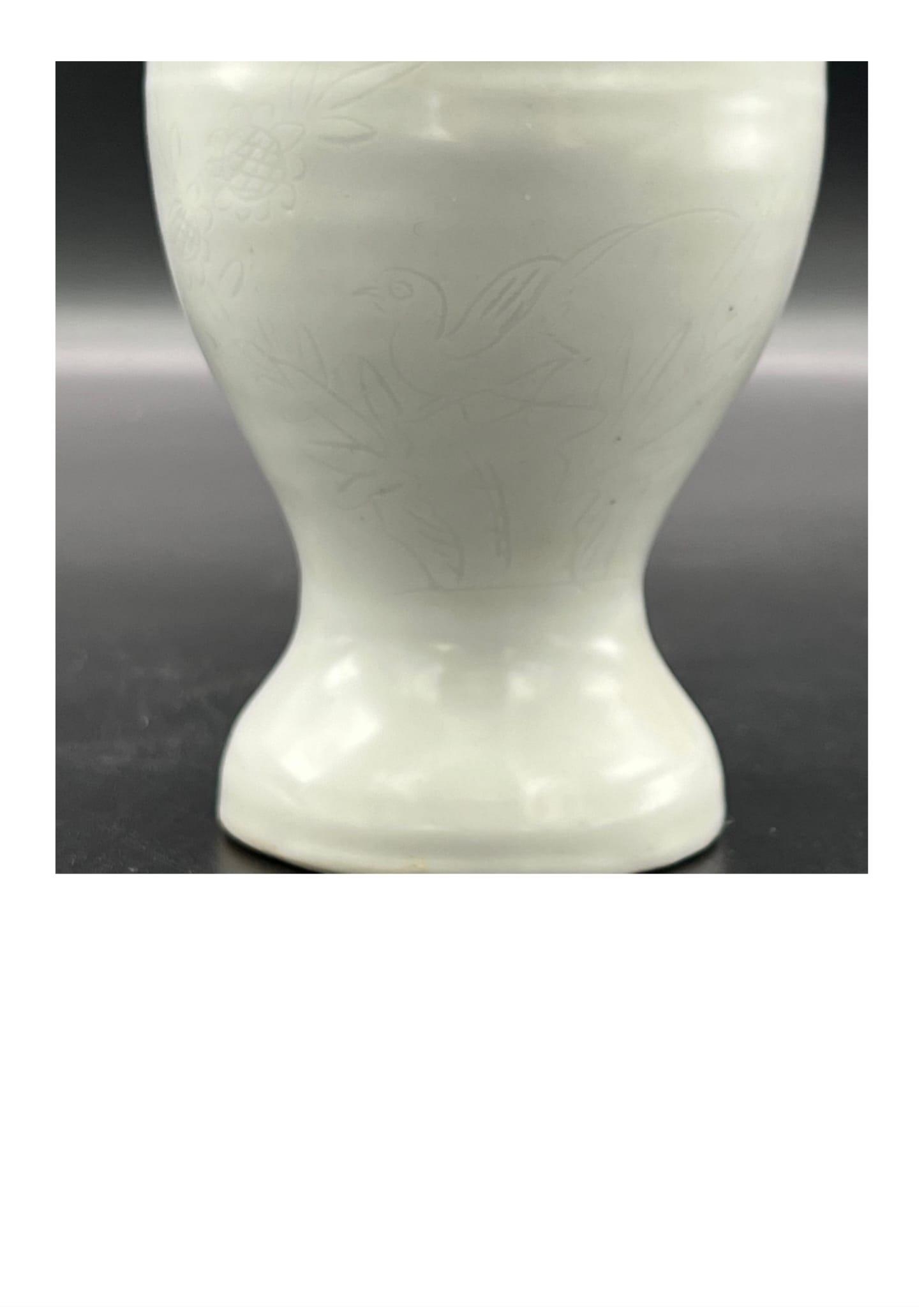 A “sweet white” glazed two-handled vase with flower and bird pattern, Late Ming Dynasty. Minor - Image 4 of 9
