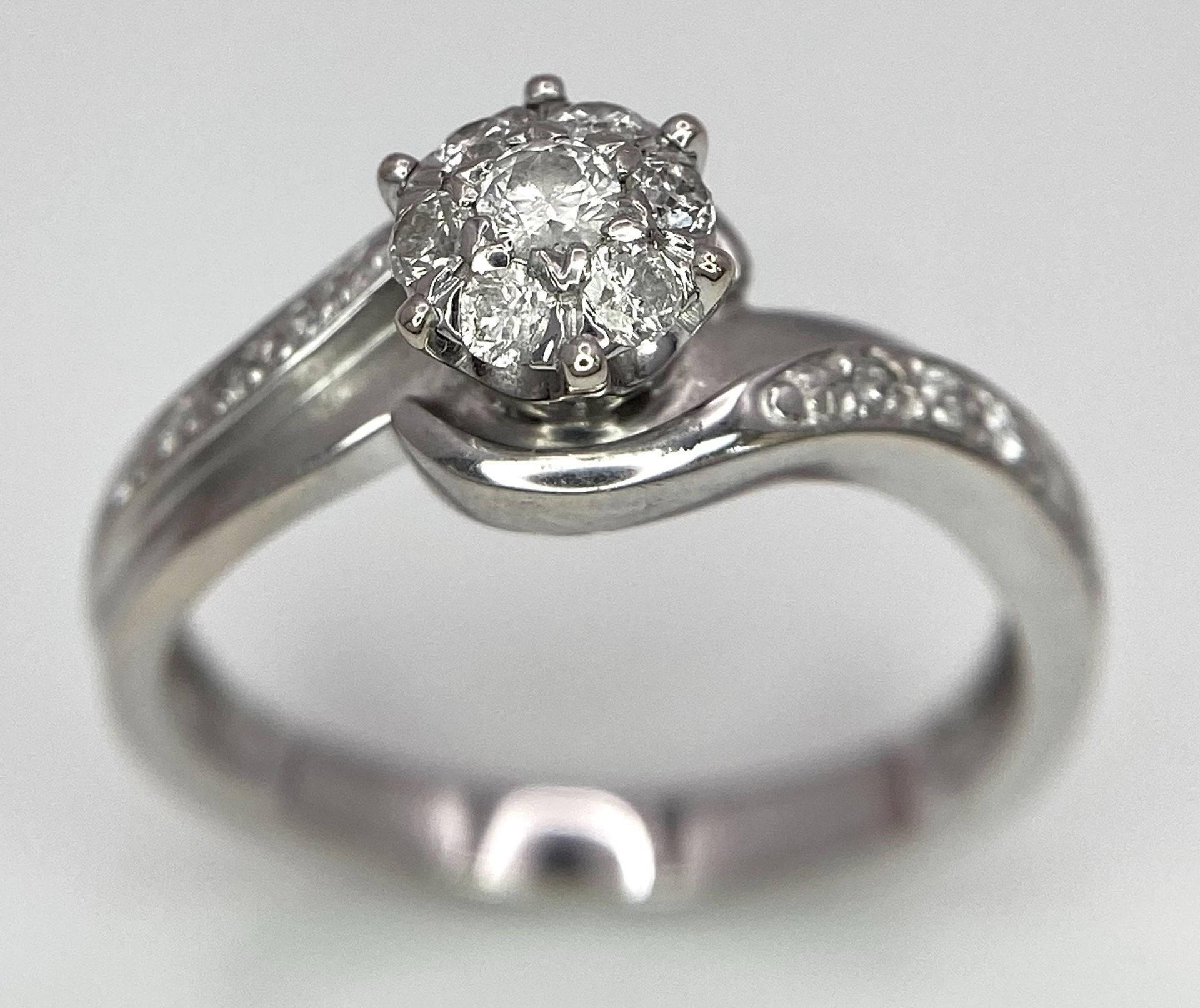 A 9K WHITE GOLD DIAMOND RING. 0.25ctw, Size L, 2.3g total weight. Ref: 8034