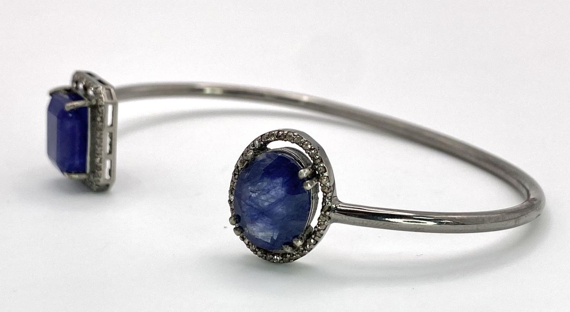 A 15ctw Blue Sapphire with 0.65ct Diamond Surround Silver Cuff Bangle. Comes with a presentation - Image 2 of 5