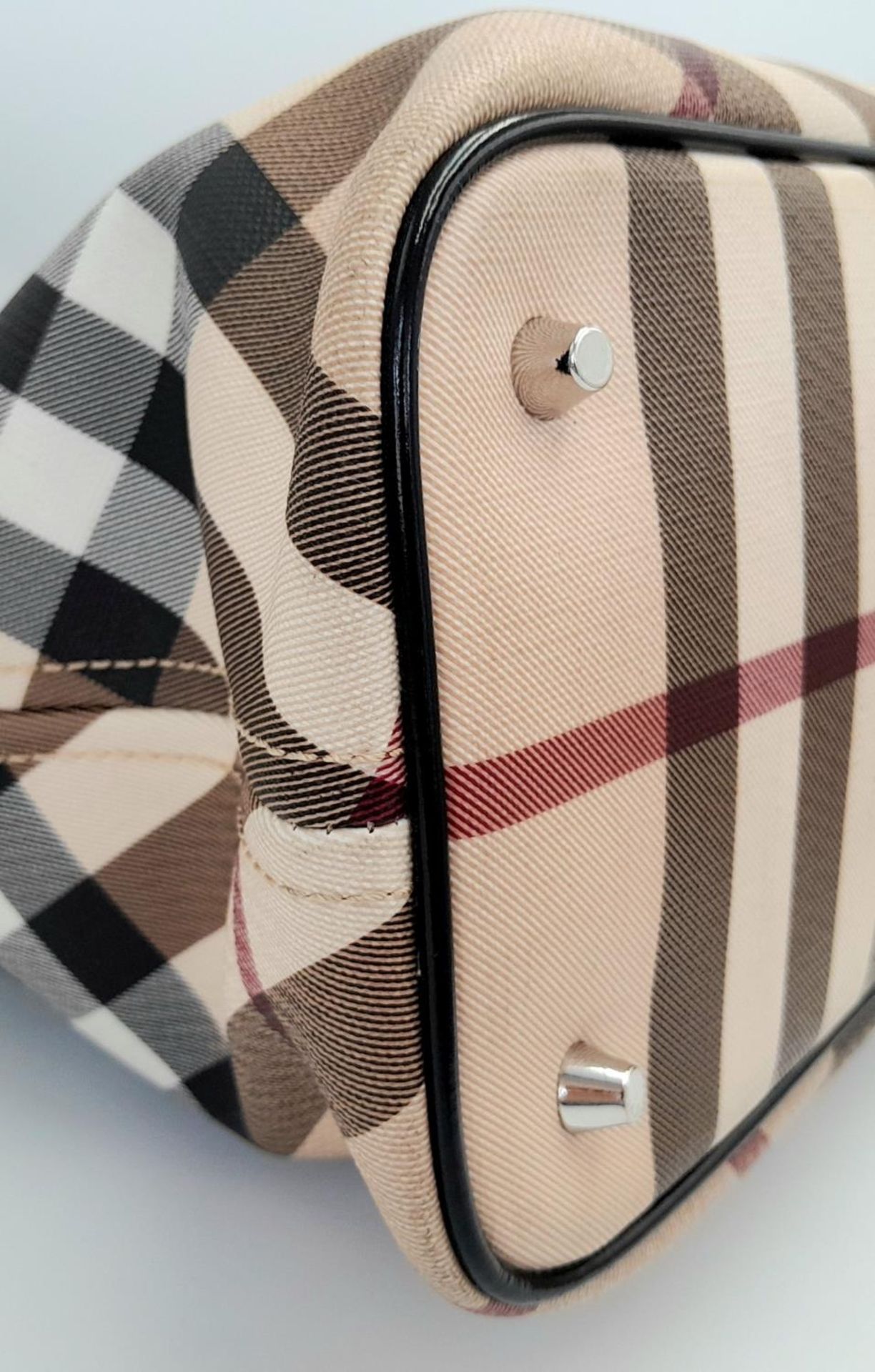A Burberry Beige Check Nova Bag. Coated canvas exterior with leather trim, two leather straps, - Image 5 of 13