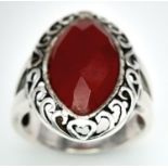 A Red Stone on 925 Silver Ring. Size P, 5.85g total weight.