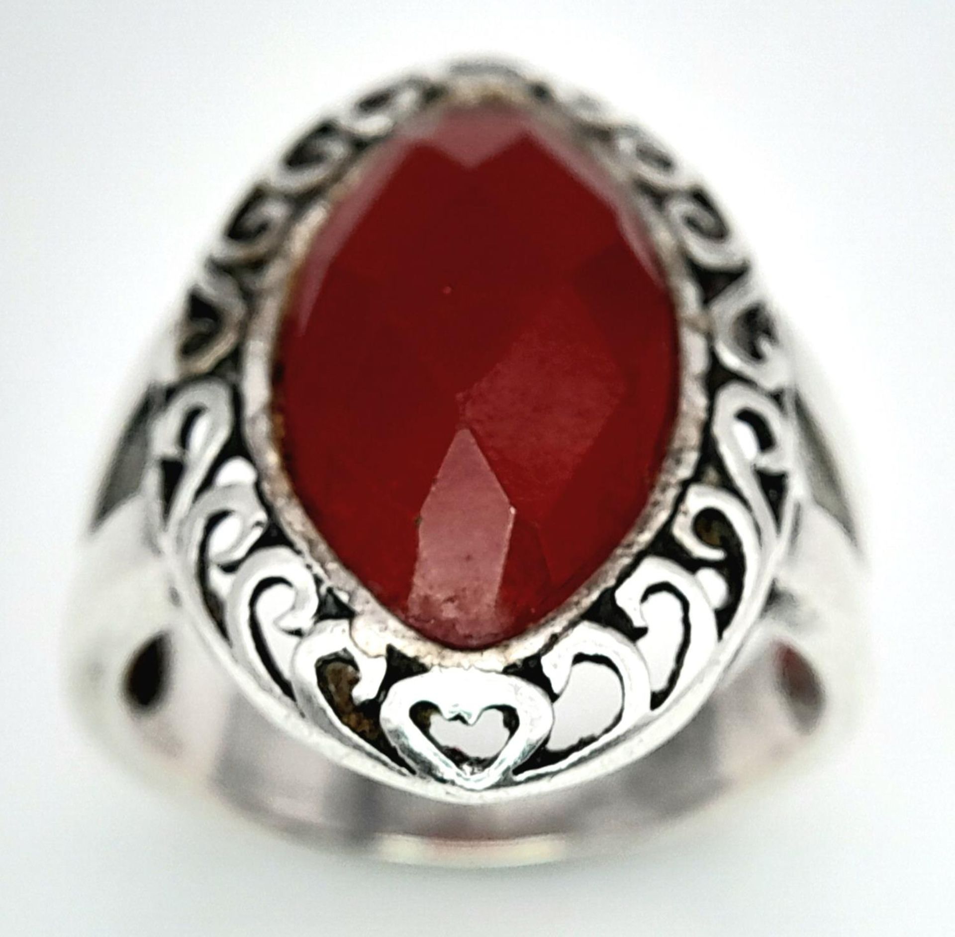 A Red Stone on 925 Silver Ring. Size P, 5.85g total weight.