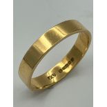 18 carat GOLD BAND RING. Having beautiful smooth clean lines with full UK hallmark. 3.3 grams.