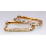 A Pair of 14K Yellow Gold and Diamond Massika Rectangular Earrings. 1.6g total weight.