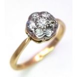 AN 18K YELLOW GOLD & PLATINUM VINTAGE OLD CUT DIAMOND CLUSTER RING. 0.25ctw, size M, 2g total