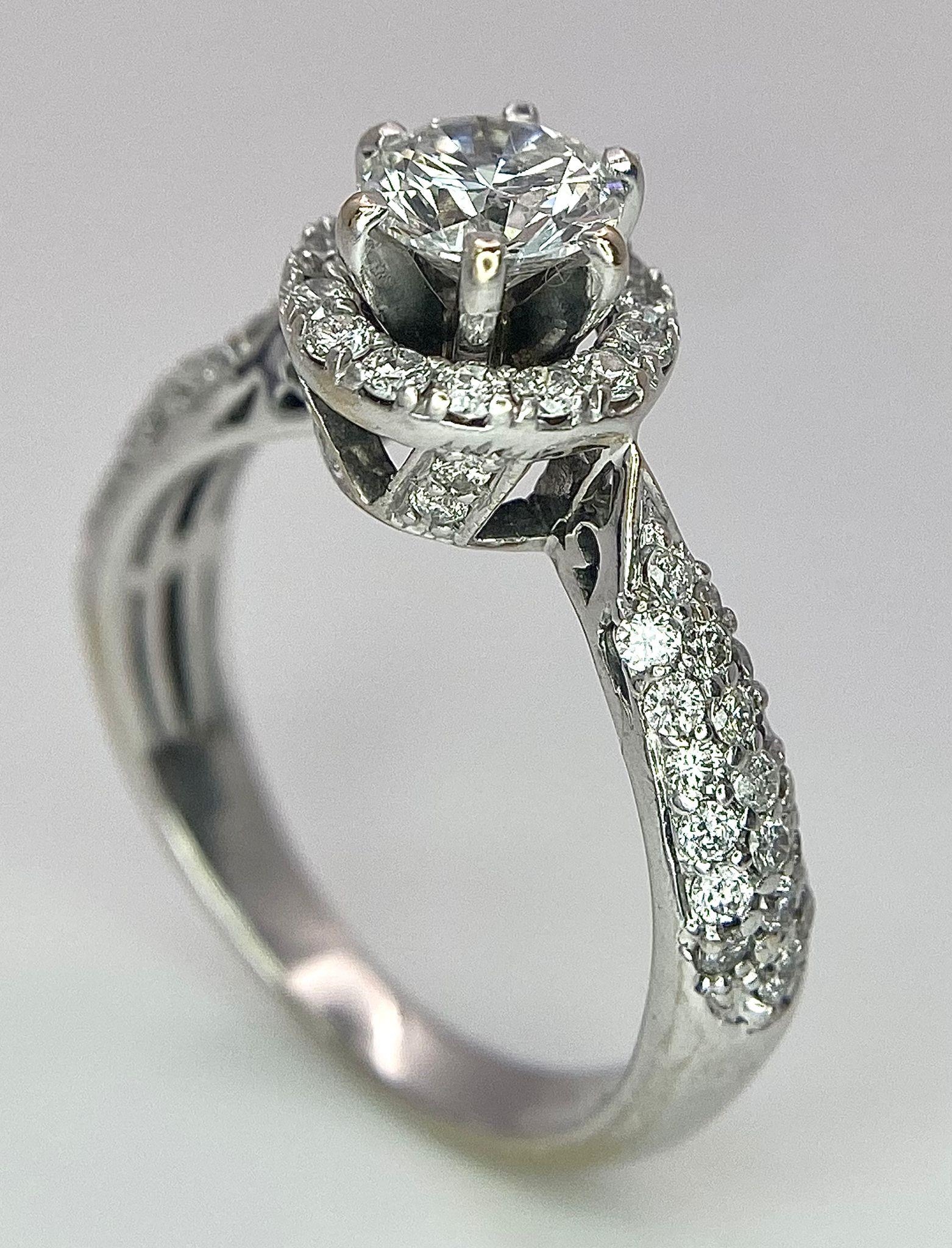 An 18K White Gold Diamond Ring. Central 0.75ct brilliant round cut diamond with a diamond halo and - Bild 4 aus 10