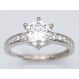 A 1ct Moissanite Ring set in 925 Silver. Size O. Comes with a GRA certificate.