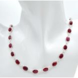 A Ruby Gemstone Long Chain Necklace. Oval cuts set in 925 Silver. 60cm length. Ref: CD-1319