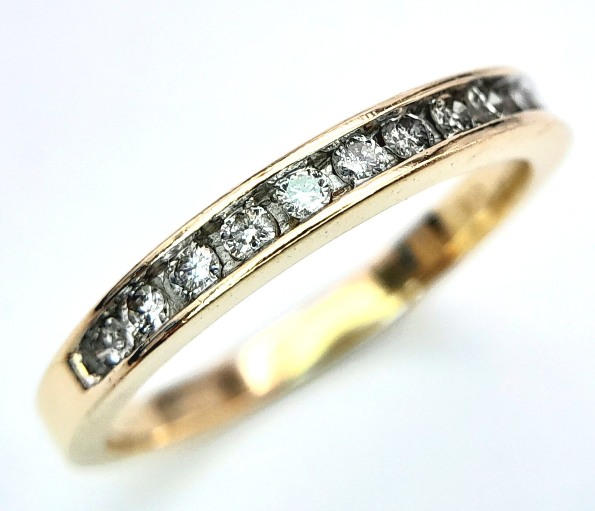 A 14K YELLOW GOLD DIAMOND HALF ETERNITY RING. 0.25ctw, Size N, 2.4g total weight. Ref: SC 8049 - Image 5 of 6