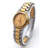 A Tissot Two Tone Quartz Ladies Watch. Two tone bracelet and case - 23mm. Gold tone dial. In working