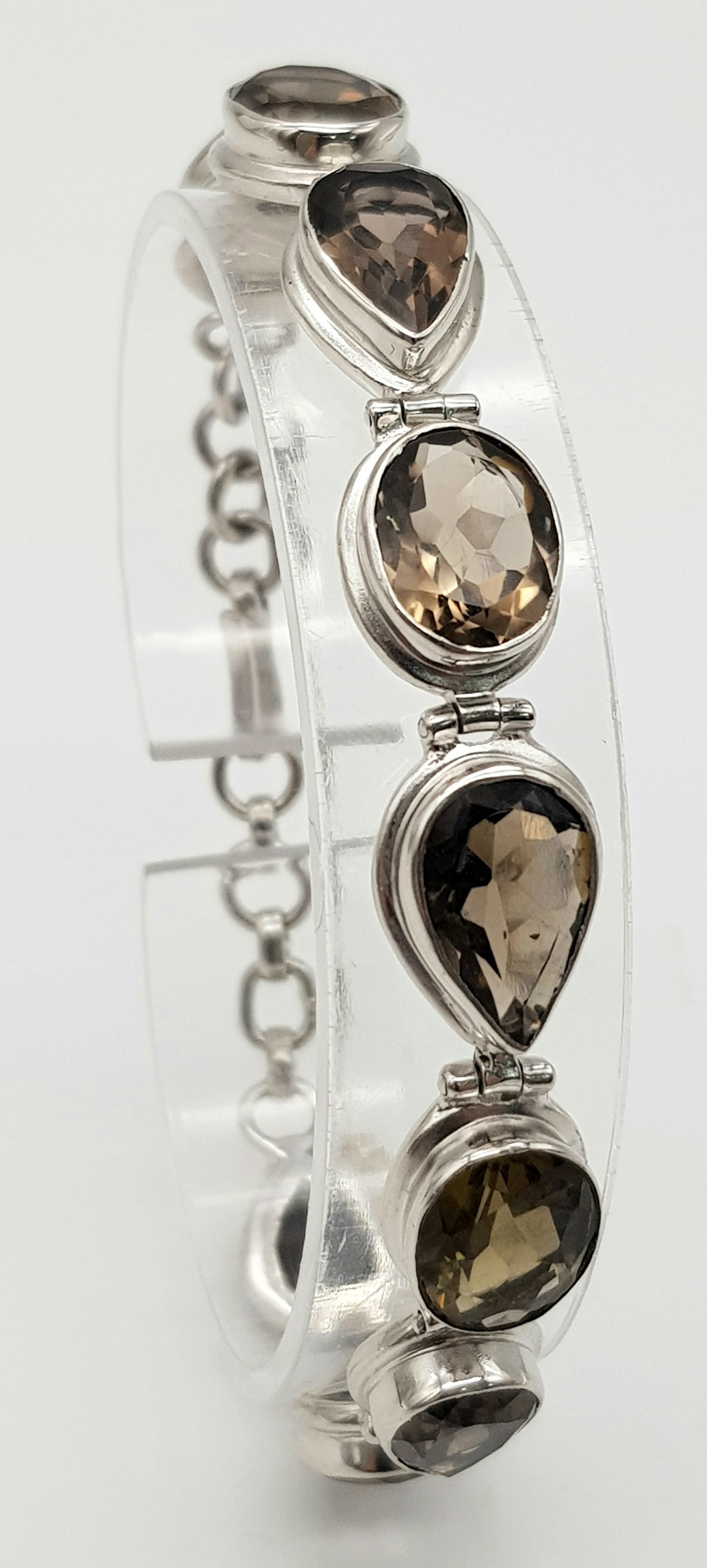 A Silver Smoky Quartz Tennis Bracelet. Set in 925 Sterling silver. 39ctw. W- 19.4g. Ref: HV2242 - Image 2 of 5