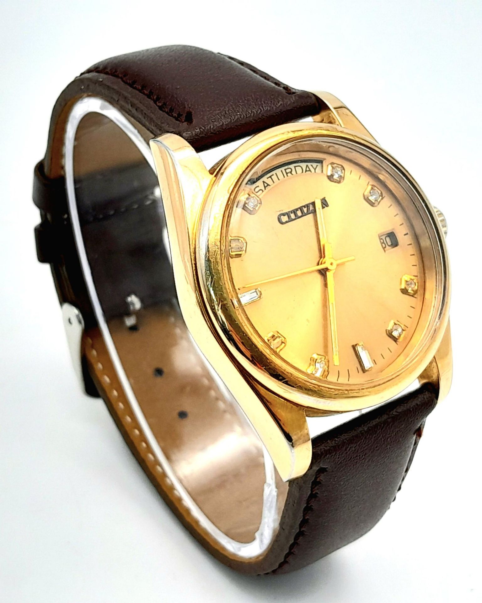 A Citizen Automatic Stone Set Watch. Brown leather strap. Gold plated case - 36mm. Gold tone dial - Image 3 of 6