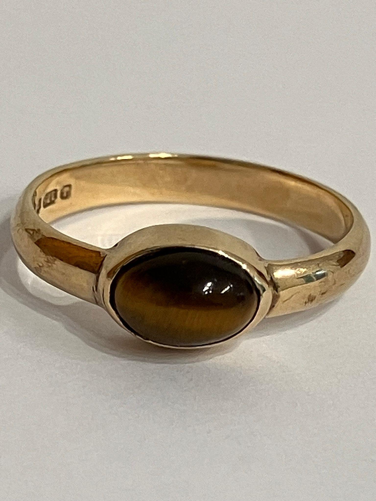 Ladies 9 carat GOLD ,TIGERS EYE RING. Full UK Hallmark. Complete with ring box. 1.9 grams. Size L.