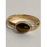 Ladies 9 carat GOLD ,TIGERS EYE RING. Full UK Hallmark. Complete with ring box. 1.9 grams. Size L.