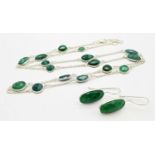 An Emerald Gemstone Long Chain necklace with Matching Drop Earrings. Set in 925 silver. 64cm