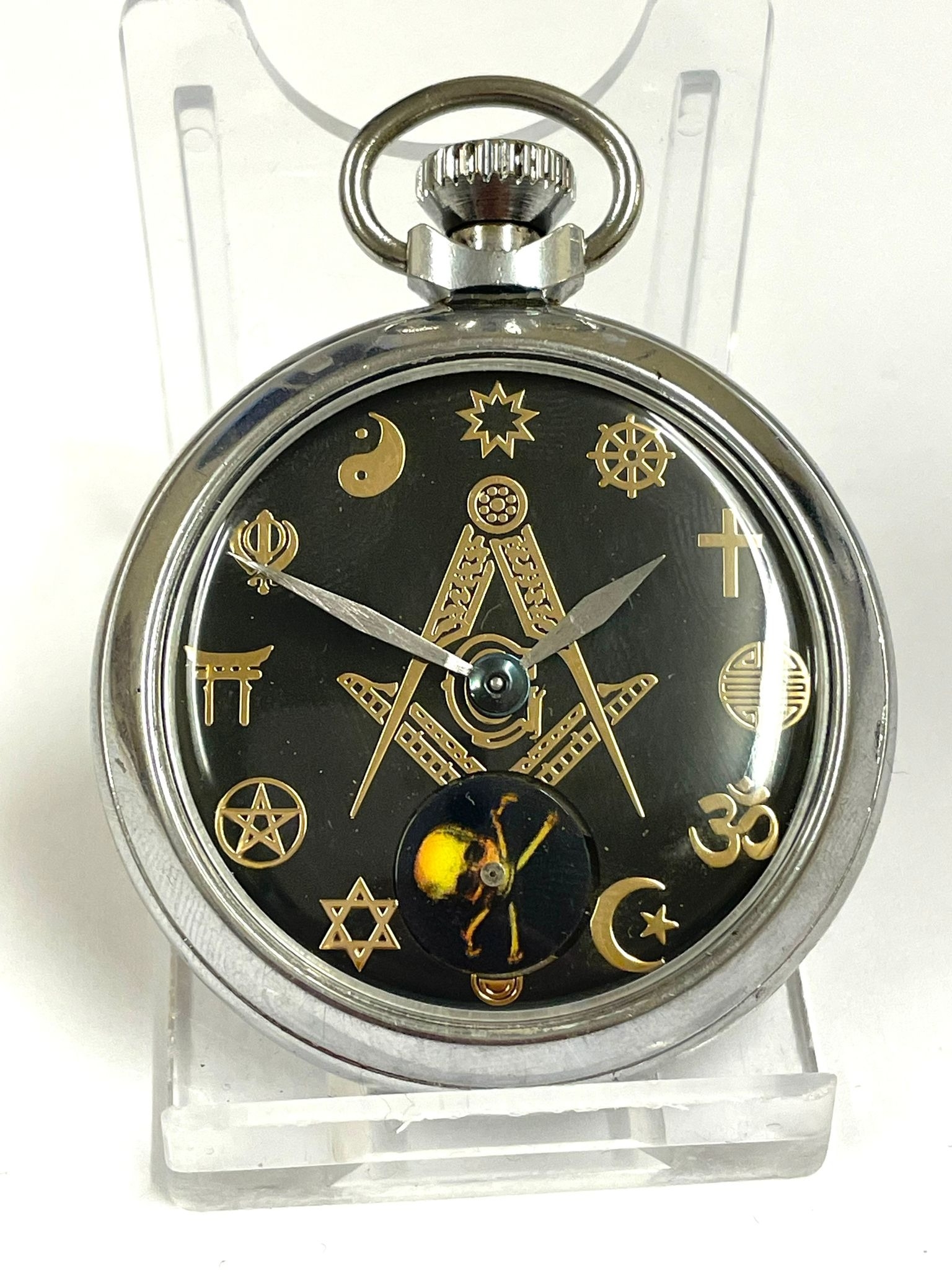 A Vintage Masonic pocket watch automaton ( rotating skull ). In working order.