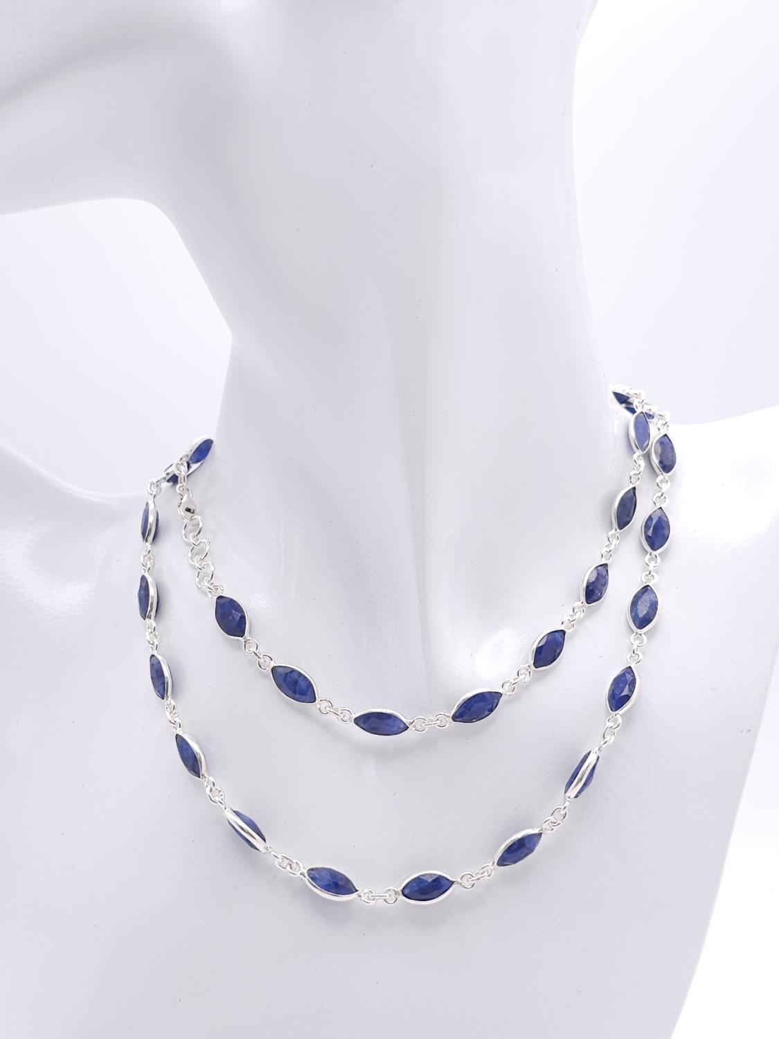 A Marquise Shape Blue Sapphire Long Chain Necklace. Set in 925 Silver. 62cm. Ref: CD-1318