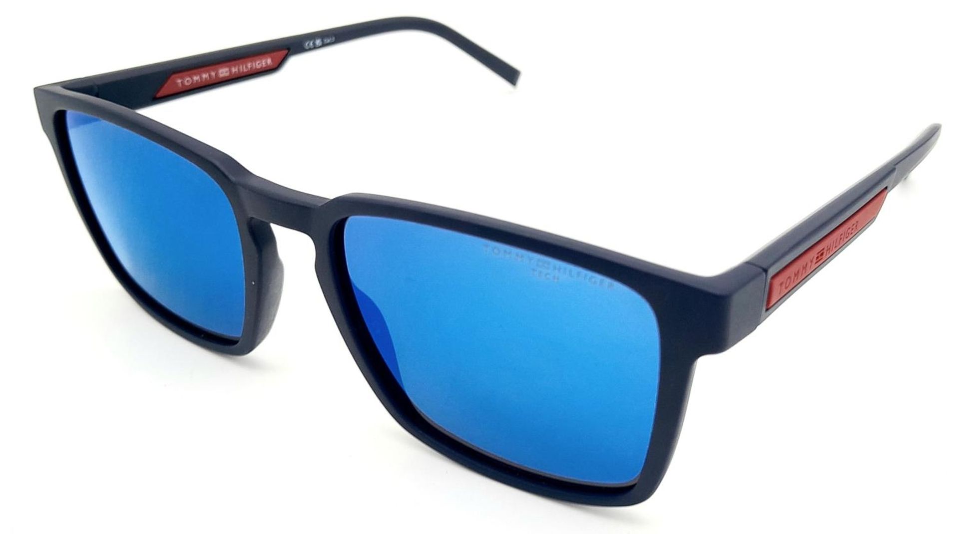 A Pair of Designer Tommy Hilfiger Sunglasses.