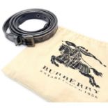 A Burberry Gun Metal Grey Shimmer Double Wrap Belt. Leather and textile with black-toned hardware.