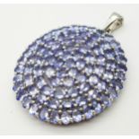 An Unworn, Fully Certified Limited Edition (1 of 40), Sterling Silver Tanzanite Set Pendant. 4.5cm