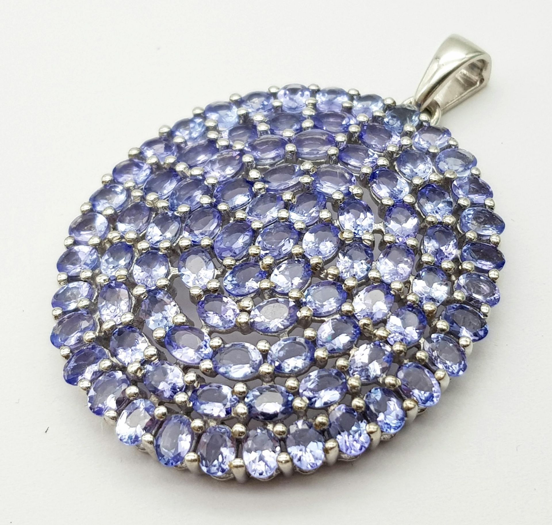 An Unworn, Fully Certified Limited Edition (1 of 40), Sterling Silver Tanzanite Set Pendant. 4.5cm