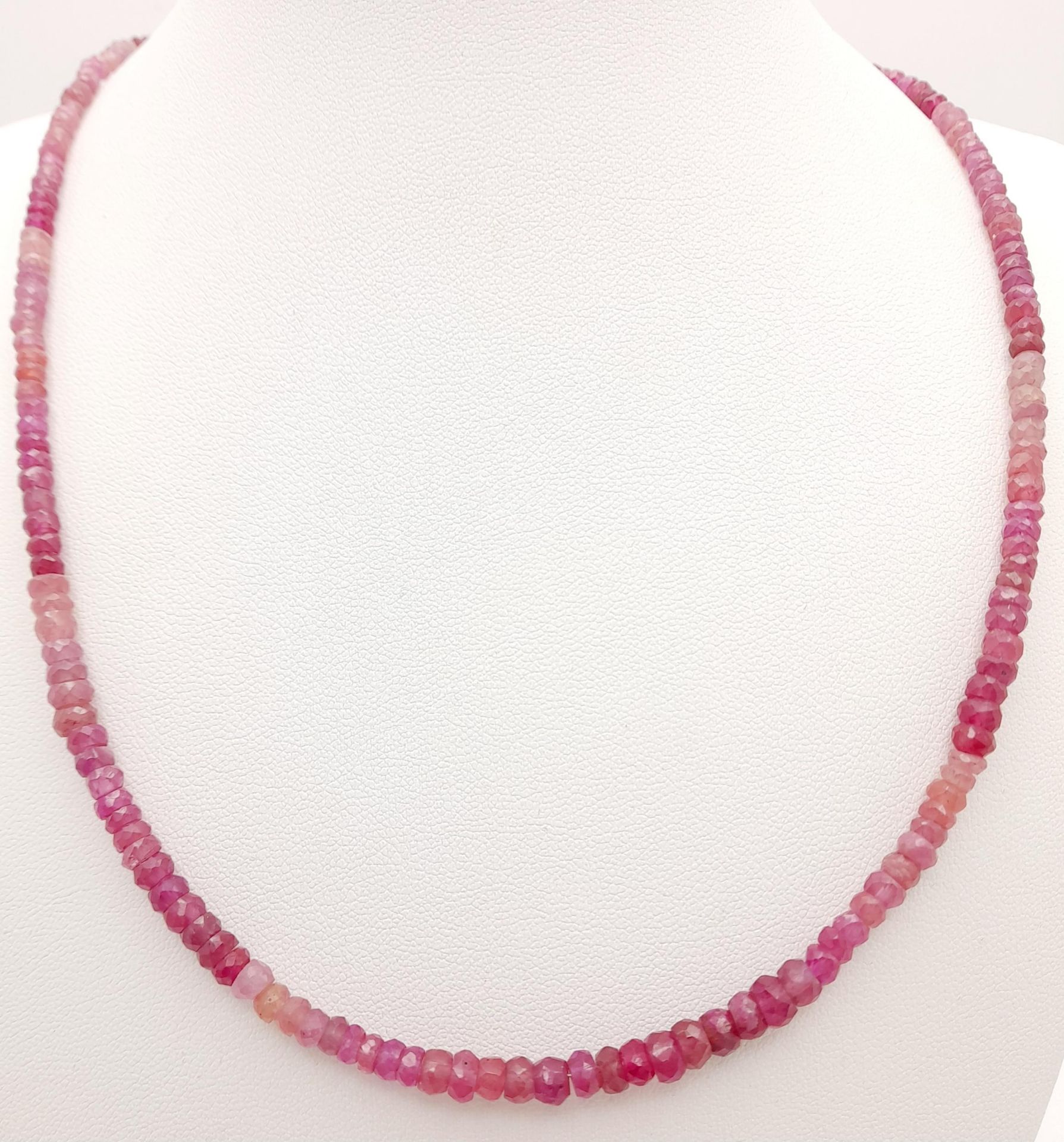 A 90ctw Ruby Rondelle Gemstone Single strand Necklace -with a Ruby and 925 Silver clasp. 44cm - Image 2 of 3