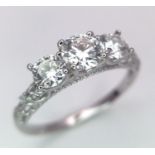 A 0.5ct Three Stone Moissanite, 925 Silver Ring. Size N. Comes with a GRA cert.