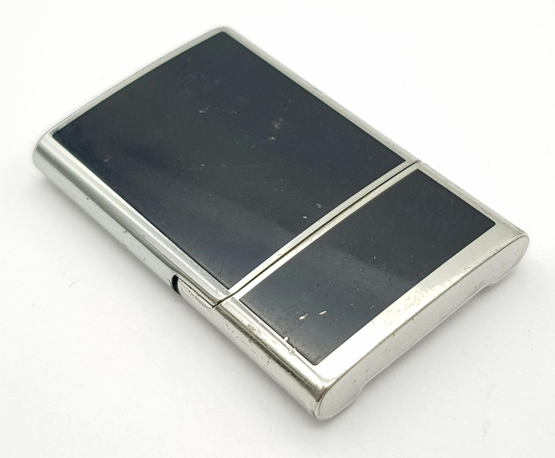 A Vintage Givenchy Black Enamel Lighter. Needs gas and flint. 5cm x 3.5cm. UK sales only. - Image 5 of 5