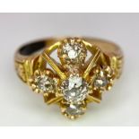 A 9K Yellow Gold (tested) Diamond Ring. Five round cut diamonds on a raised setting. Size N. 4.32g