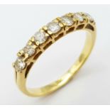 AN 18K (TESTED) YELLOW GOLD DIAMOND BAND RING. 0.35ctw, size I, 1.9g total weight. Ref: SC 9043